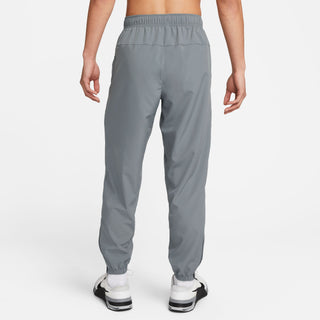 Nike Mens Dri-FIT Tapered Versatile Pants | Smoke Grey/Reflective Silver