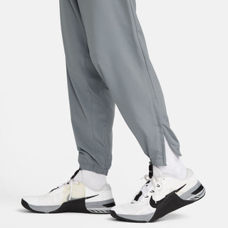 Nike Mens Dri-FIT Tapered Versatile Pants | Smoke Grey/Reflective Silver