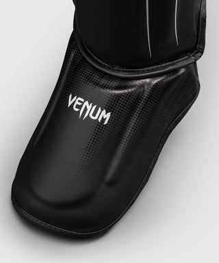Venum Stealth Shin Guards | Black/White