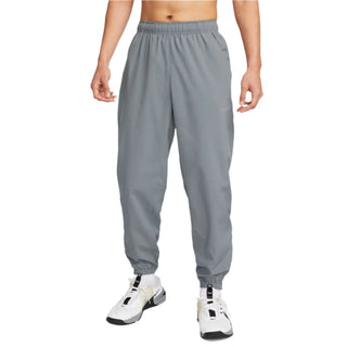 Nike Mens Dri-FIT Tapered Versatile Pants | Smoke Grey/Reflective Silver